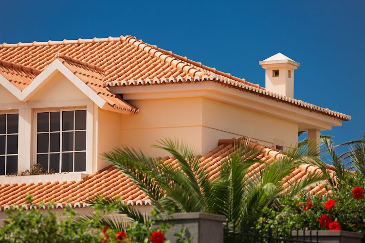 Orange tiled roof of a large house
