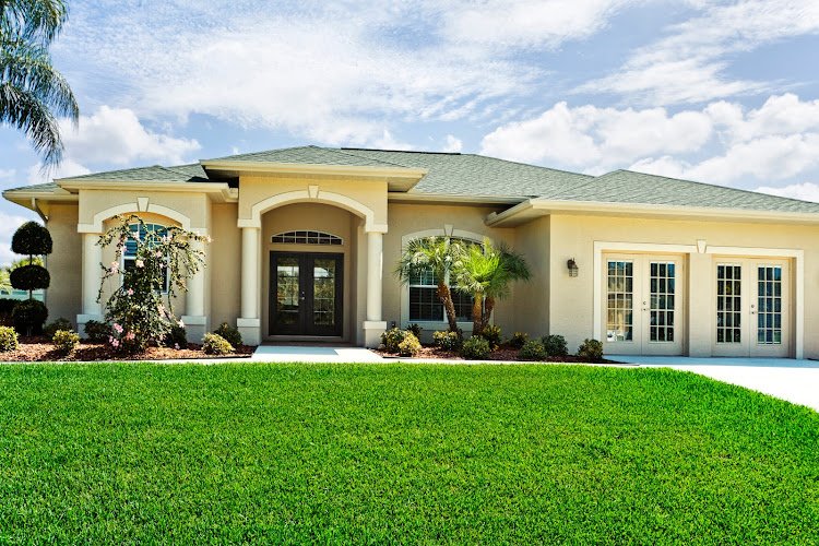 New House with a two car garage sunny beautiful day